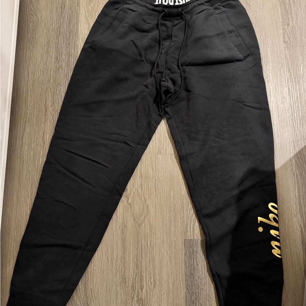 Nike Black Joggers with Gold & Silver shoes Detail